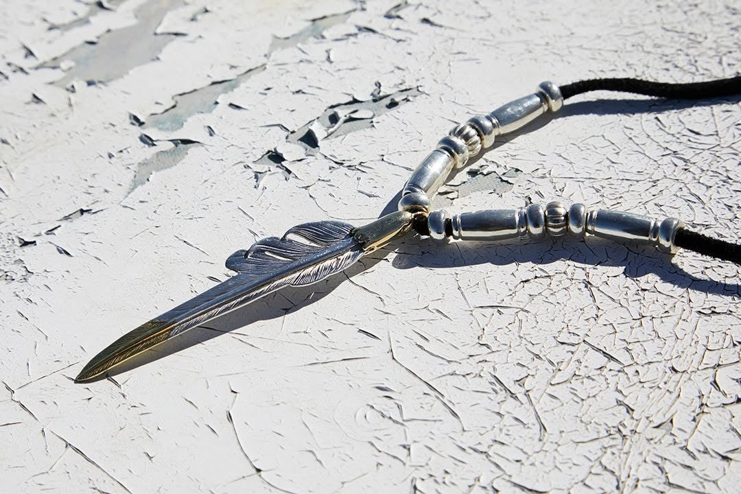 Larry Smith EAGLE HEAD KAZEKIRI FEATHER PENDANT – Blue Works